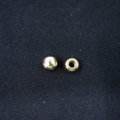 cord end ball in gold metal