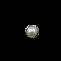pearl button with gold pattern outline