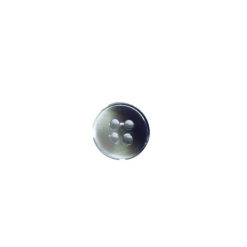 plastic button in black and white with 4 holes