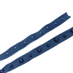 trims blue tape with dark blue rivet